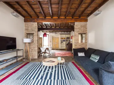a living room with a couch and a table at Apartment Pantheon View by Interhome in Rome