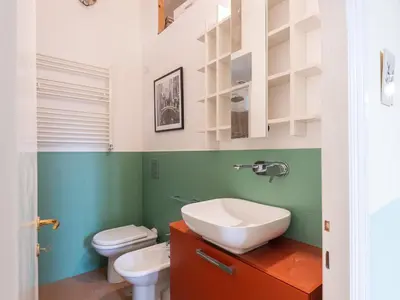 a bathroom with a sink and a toilet at Apartment Babuino by Interhome in Rome