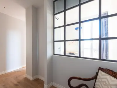 a room with a bench in front of a window at Apartment Luminosa Vittoria by Interhome in Rome