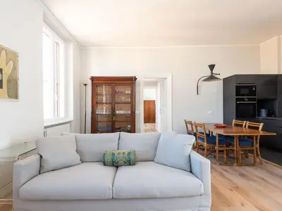 a living room with a couch and a table at Apartment Luminosa Vittoria by Interhome in Rome