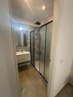 a bathroom with a shower and a sink at YouRoominRome in Rome