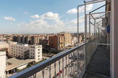 a view of a city from a balcony at YCH-Ponte Lungo apartment in Rome