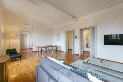 a living room with a couch and a table at Family Stay in Trastevere in Rome