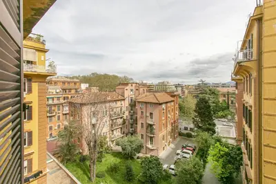 a view of a city from a building at Family Stay in Trastevere in Rome