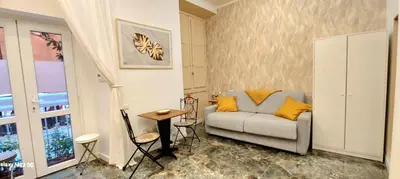 a living room with a couch and a table at Rome Center Bello Loft in Rome
