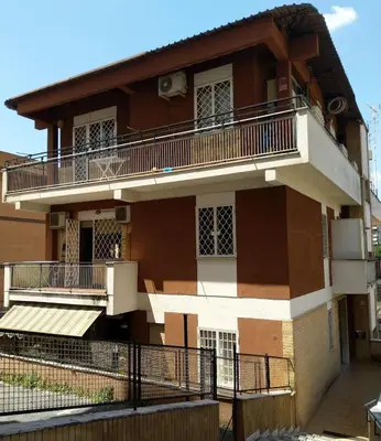 a building with balconies on the side of it at Casa Carlo in Rome