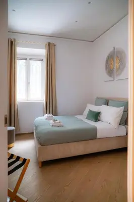 a bedroom with a bed in a room at Sette Chiese Apartment in Rome
