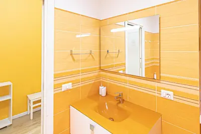 a bathroom with a sink and a mirror at Grace's house Roma Trastevere in Rome
