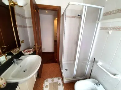 a bathroom with a shower and a sink and a toilet at Holiday apartment in Rome in Rome