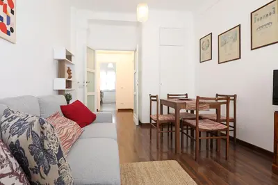 a living room with a couch and a table at Casa Cestia San Saba in Rome