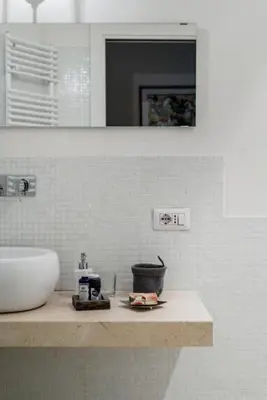 a bathroom with a sink and a counter top with a sink at Charming apartment near Villa Borghese in Rome