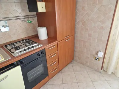 a kitchen with a stove and a counter top at Casa Kathy Rome in Rome