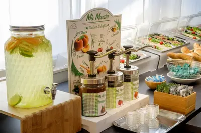 a kitchen with a buffet of food and drinks at Hotel Marc'Aurelio in Rome