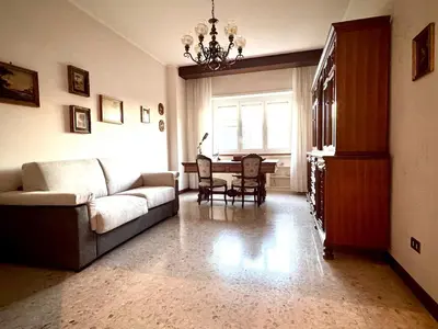 a living room with a couch and a table at Millys Apartment Rome Centre 
