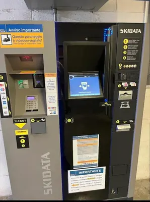 a atm machine with a screen on top of it at Tra i Musei Vaticani House in Rome