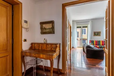 a living room with a wooden piano in a room at iFlat The Roman House - Spacious & Central Apt in Rome