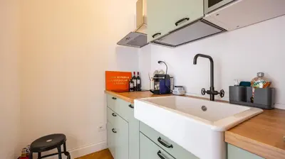 a kitchen with a sink and a counter top at Villa Paolina by Rentbeat in Rome