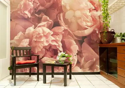 a living room with a pink flower mural at Plumeria Bianca in Rome