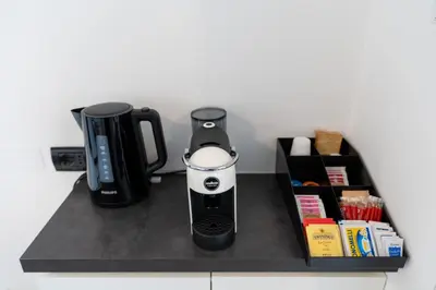a coffeemaker sitting on top of a counter at Stella su San Pietro in Rome
