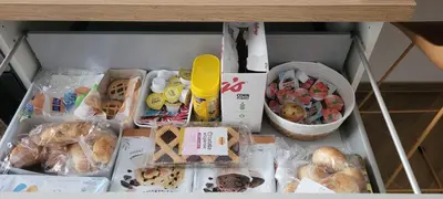 a drawer filled with different types of food at A casa di Fede b&b in Rome