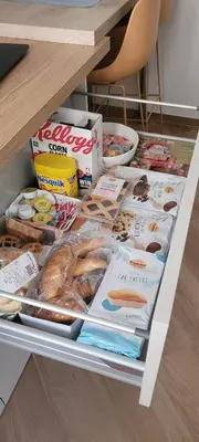 a drawer of a refrigerator filled with lots of food at A casa di Fede b&b in Rome