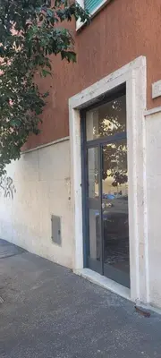 a building with a door in the side of it at A casa di Fede b&b in Rome