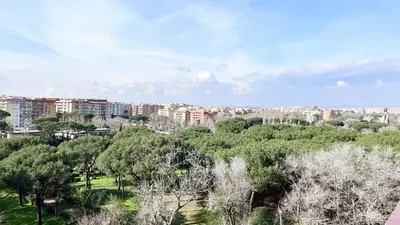 a view of a city with trees and buildings at Yellow Sweet Home in Rome
