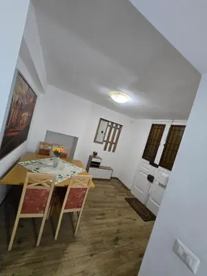 a dining room with a table and chairs in a room at Casa in Rome