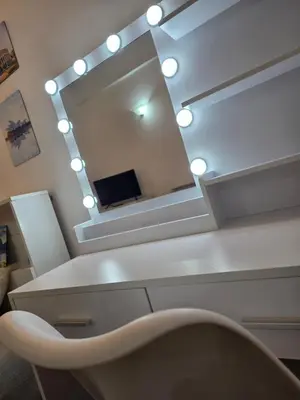 a bedroom with a bed and a table and a window at Casa in Rome