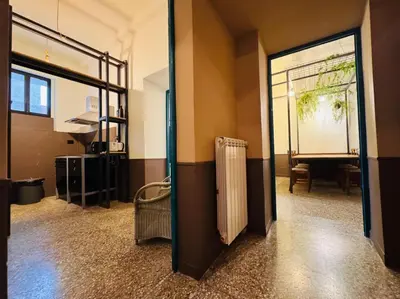 an open door to a room with a radiator at Loft Penta - apartment Colosseum in Rome