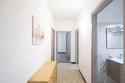 a bathroom with a sink and a mirror at Spacious and Bright 3BR Family Apartment in Rome