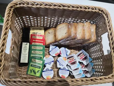 a basket filled with bread andartisanartisanartisanartisanartisanartisan at San Lorenzo Elegance Suites - just steps from the Colosseum in Rome