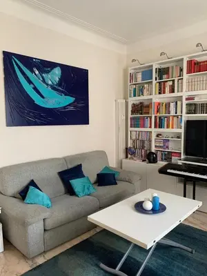 a living room with a couch and a table at Miss Giulia Prime location flat in Rome in Rome