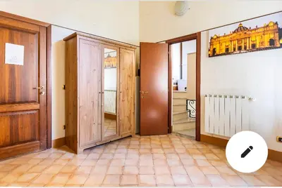 a room with an open door and a view of a building at Appartamento Roma centro 2 da 2 a 4 posti 