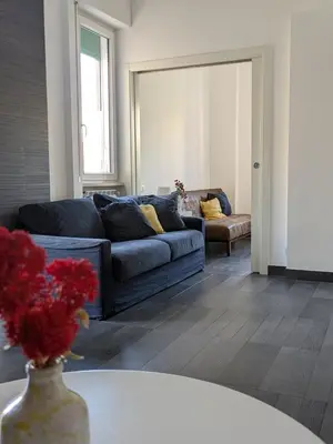 a living room with a couch and a table at Interno7 in Rome