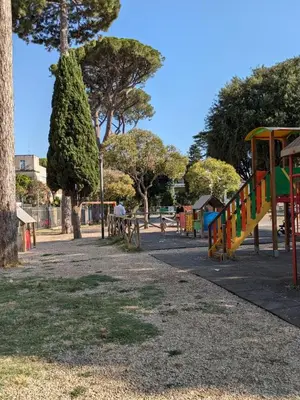 a park with a playground with a slide at Interno7 in Rome