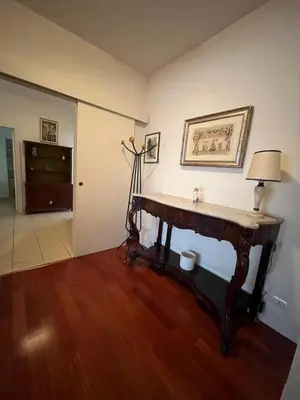a room with a table and a tripod in it at Silvana vatican apartment in Rome