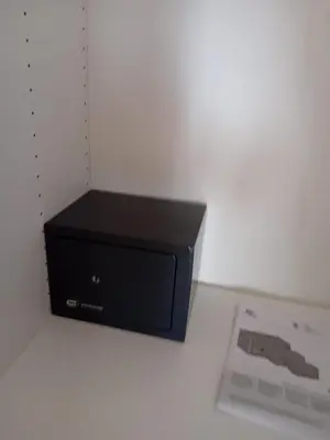 a black microwave sitting on top of a table at Boncompagni Serenity Suites in Rome