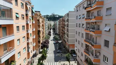 an aerial view of a street between buildings at Stellar Stays in Rome