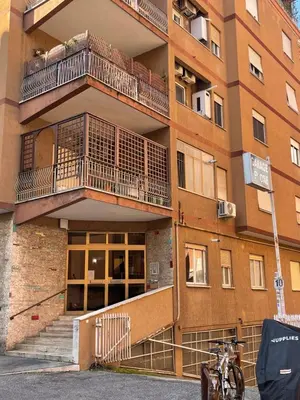 a building with balconies on the side of it at Vatican Time apartment in Rome