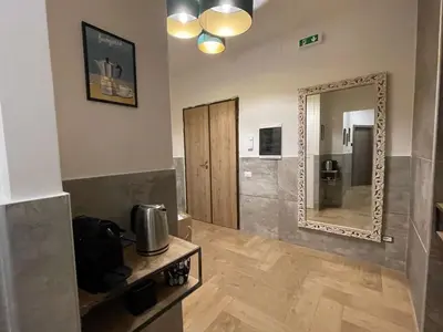 a bathroom with a mirror on the wall at San Silverio B&B in Rome
