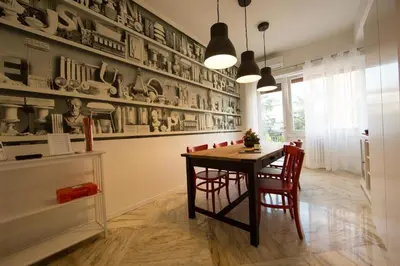 a dining room with a table and chairs at B&B Roma 474 in Rome