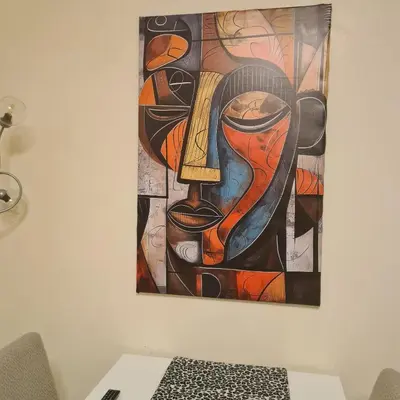 a painting of a woman on a wall at Red Moon House - tra Policlinico e Piazza Bologna in Rome