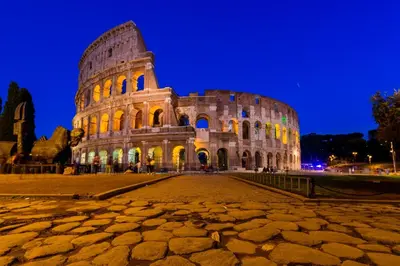 a view of the colosseum at night at Vatican 10 min Modern apartment AC, Wi-Fi, Netflix in Rome