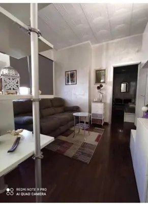 a living room with a couch and a table at Roma Centro appartamento in Rome