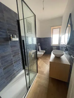 a bathroom with a shower and a sink and a toilet at la casa di Janis in Rome
