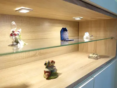 a shelf with some toy figurines on it at Triade Home in Rome