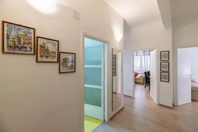 a hallway with a door leading to a living room at Da Renny in Rome