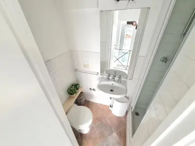a small bathroom with a toilet and a sink at Boutique Domus Spagna Ripetta in Rome