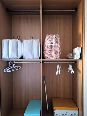 a closet with shelves with purses and other items at Locazione turistica di Alberto in Rome